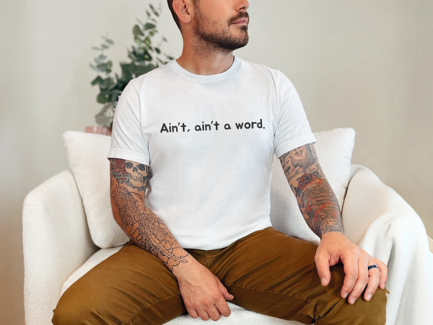 Humorous Grammar Slang Tee – "Ain't A Word" Statement Apparel