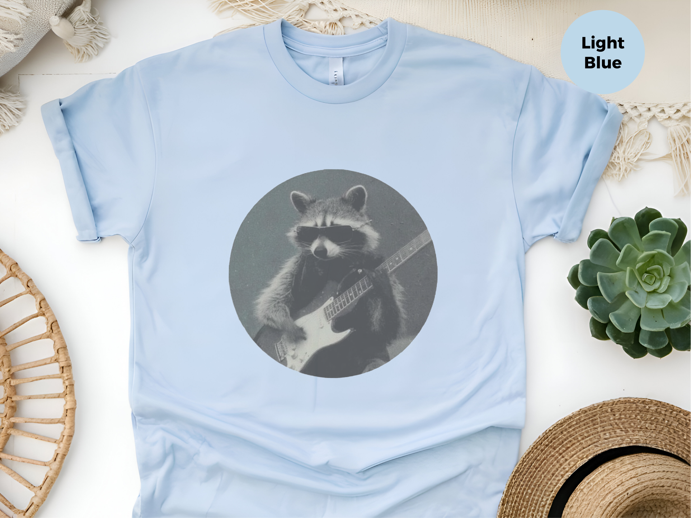 Mockup_05_Raccoon Playing Electric Guitar.png