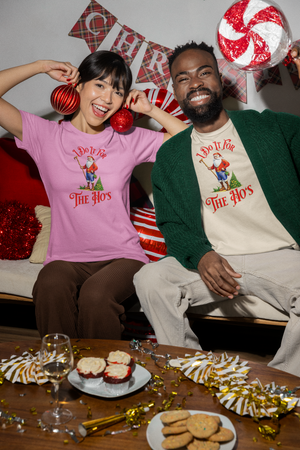 bella-canvas-t-shirt-mockup-of-a-happy-man-and-woman-in-a-christmas-themed-party-m35913.png