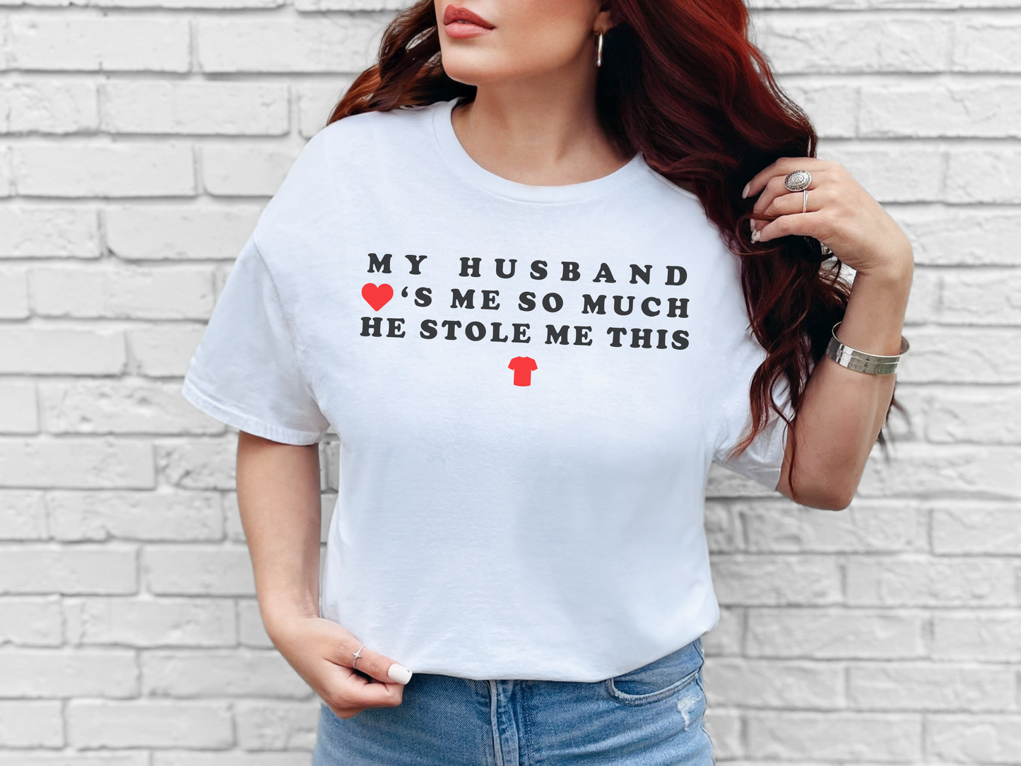 a woman wearing a t - shirt that says, my husband is me so much