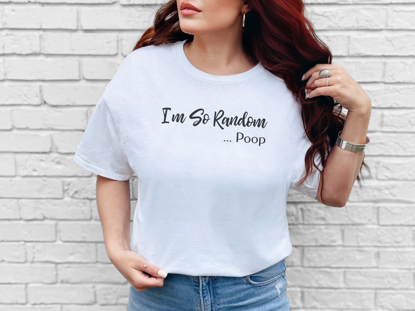 a woman wearing a white t - shirt that says i'm so random po