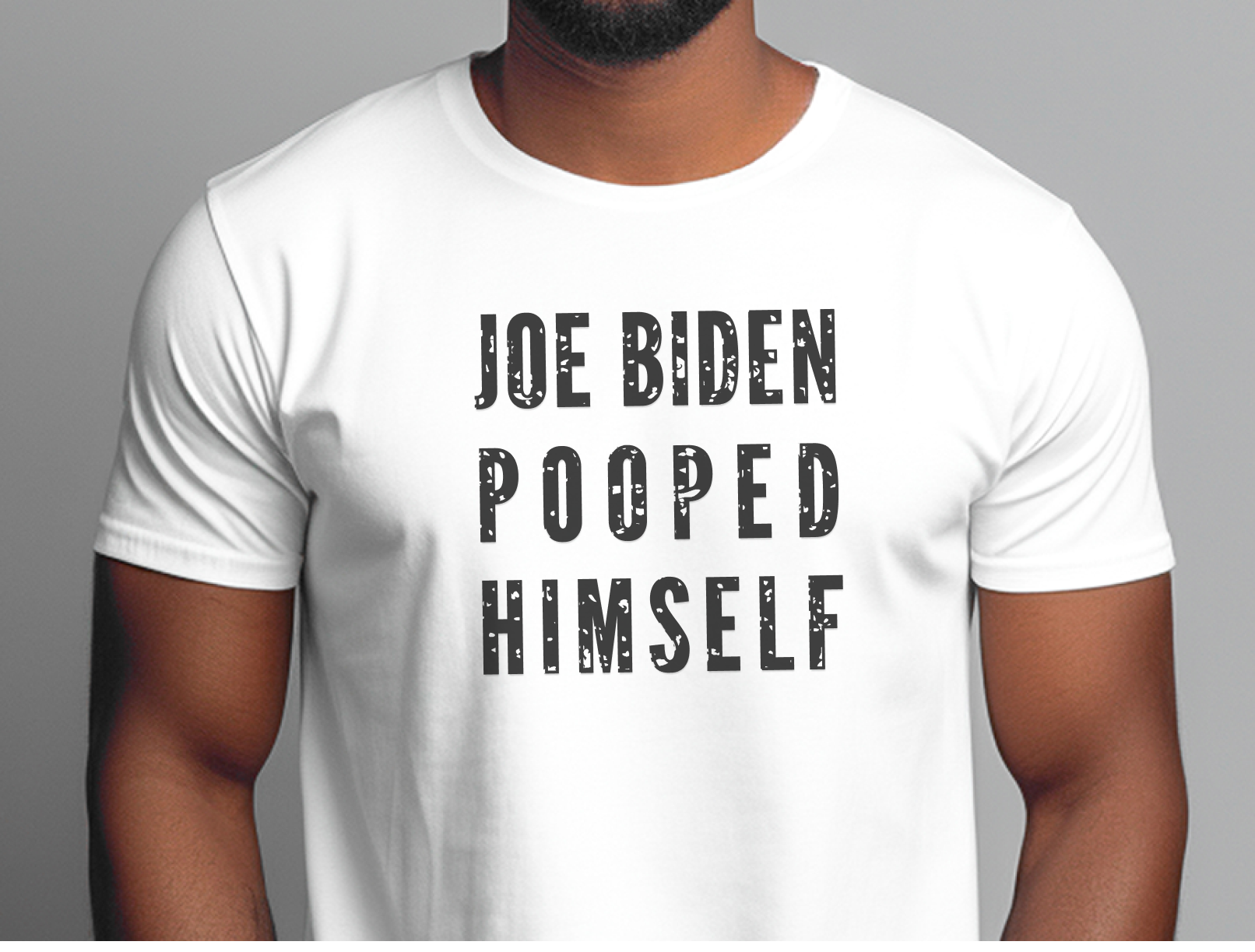 a man wearing a white t - shirt that says joe biden pooped himself