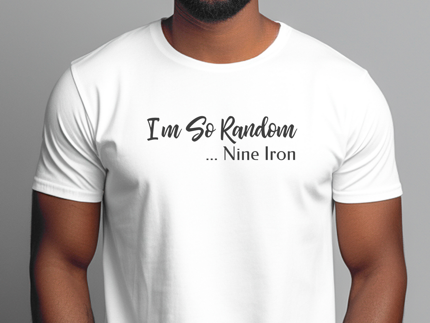 a man wearing a white t - shirt that says i'm so random nine