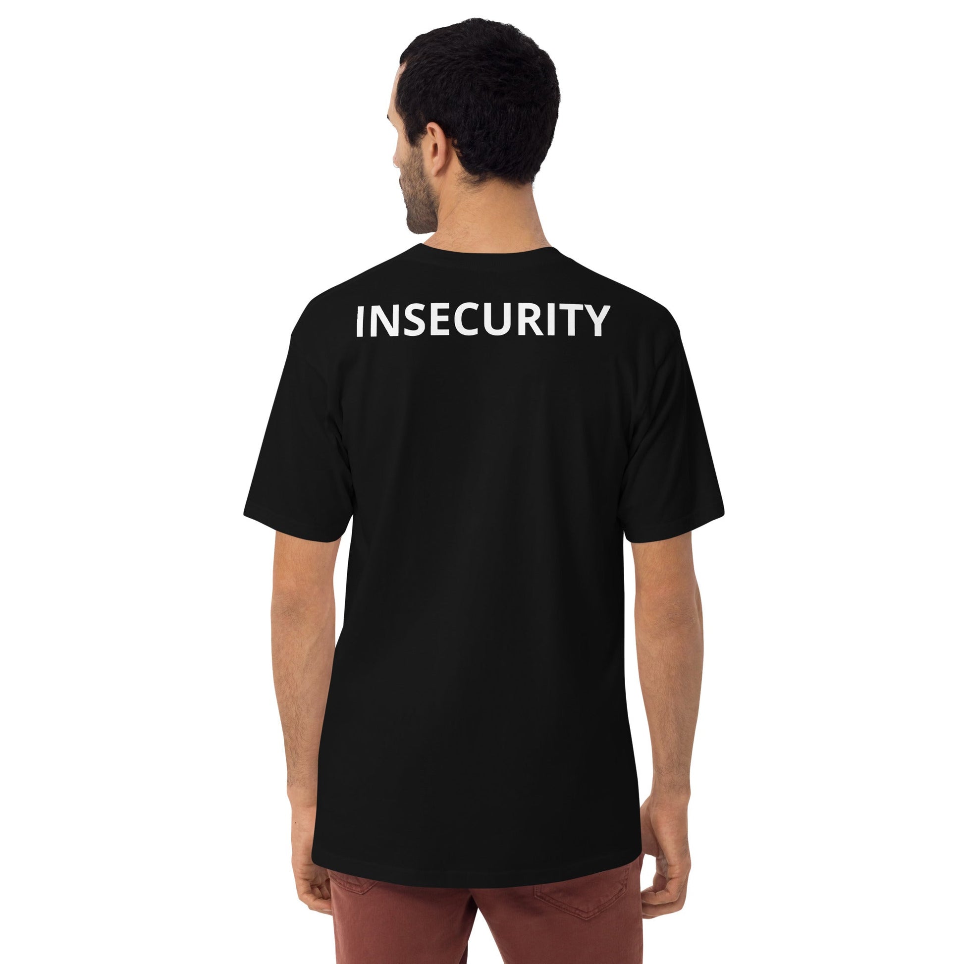 a man wearing a black t - shirt with the word insecity printed on