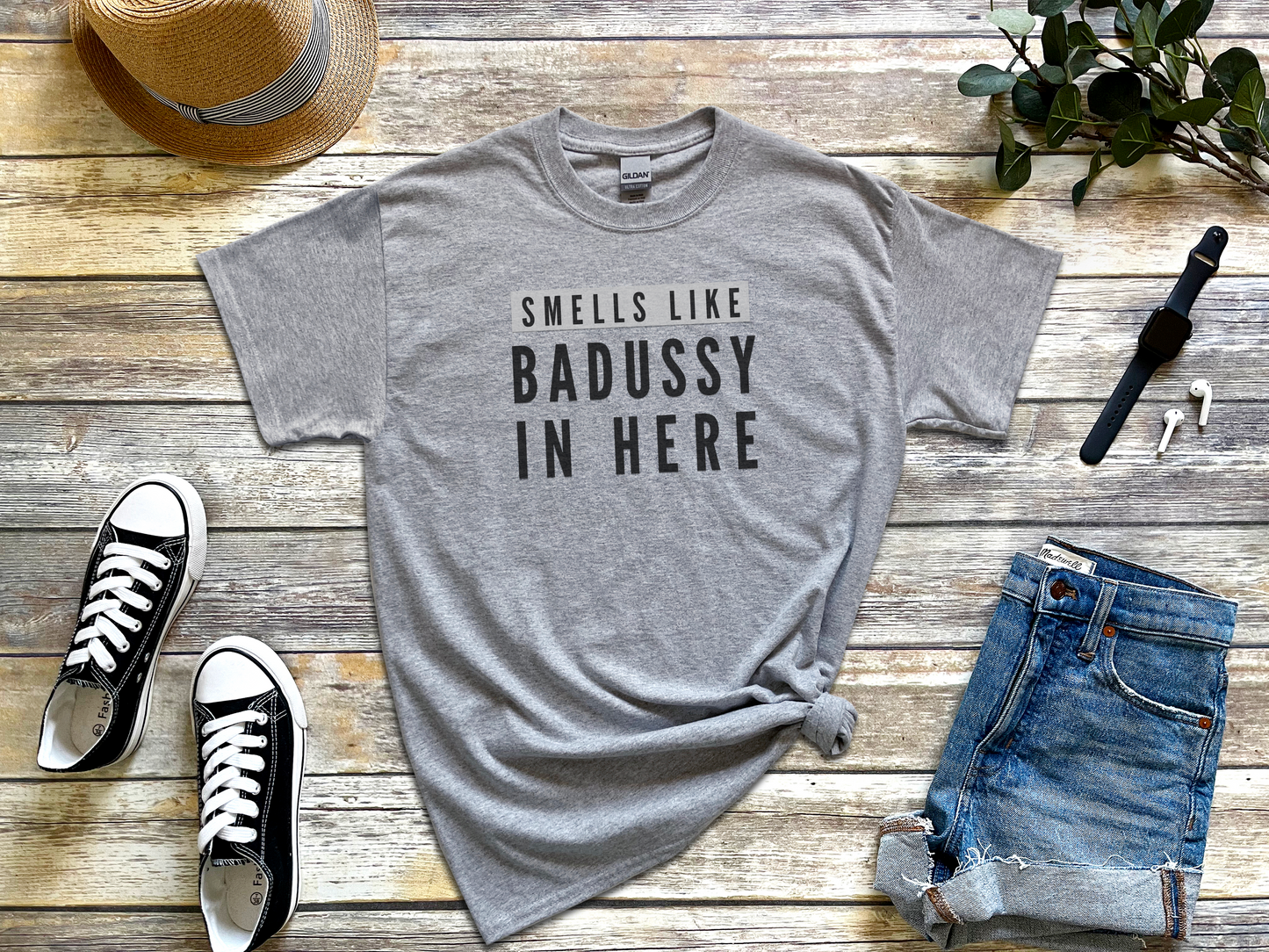 a t - shirt that says smells like badassy in here