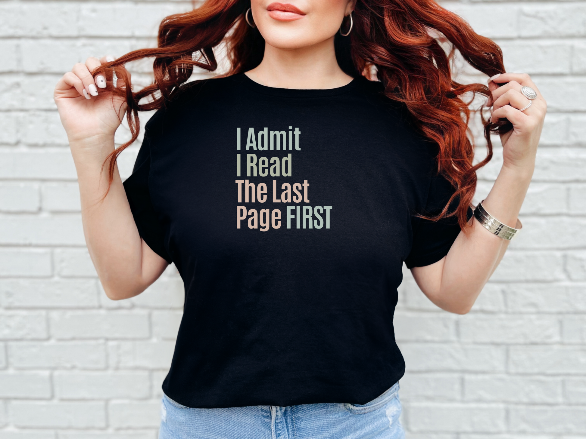 a woman wearing a black t - shirt that says i admit i read the last