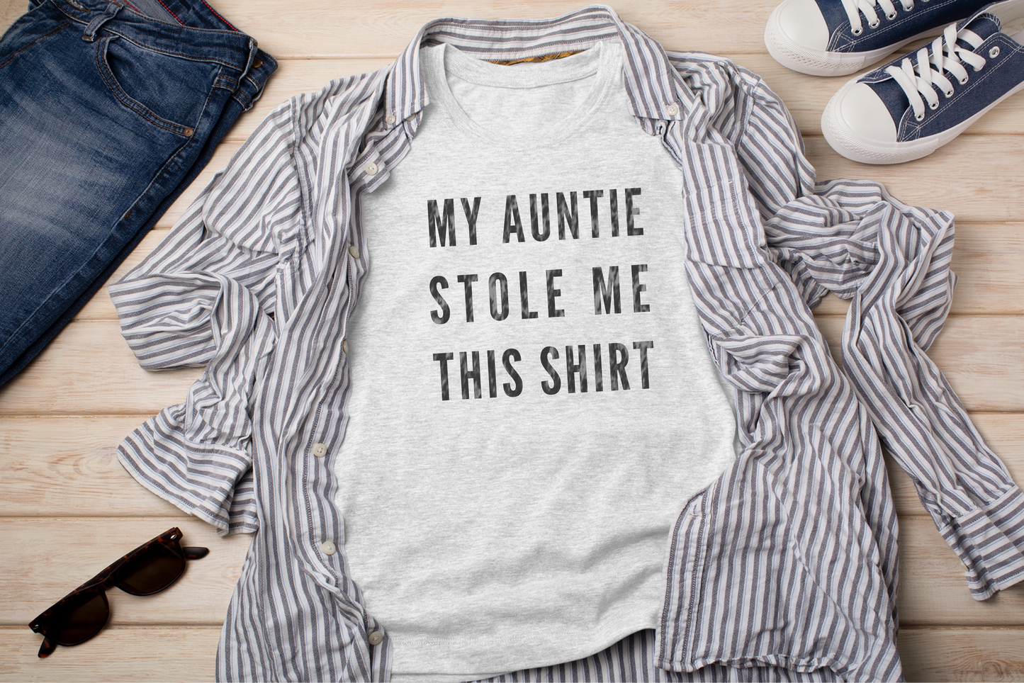 a t - shirt that says, my auntie stole me this shirt