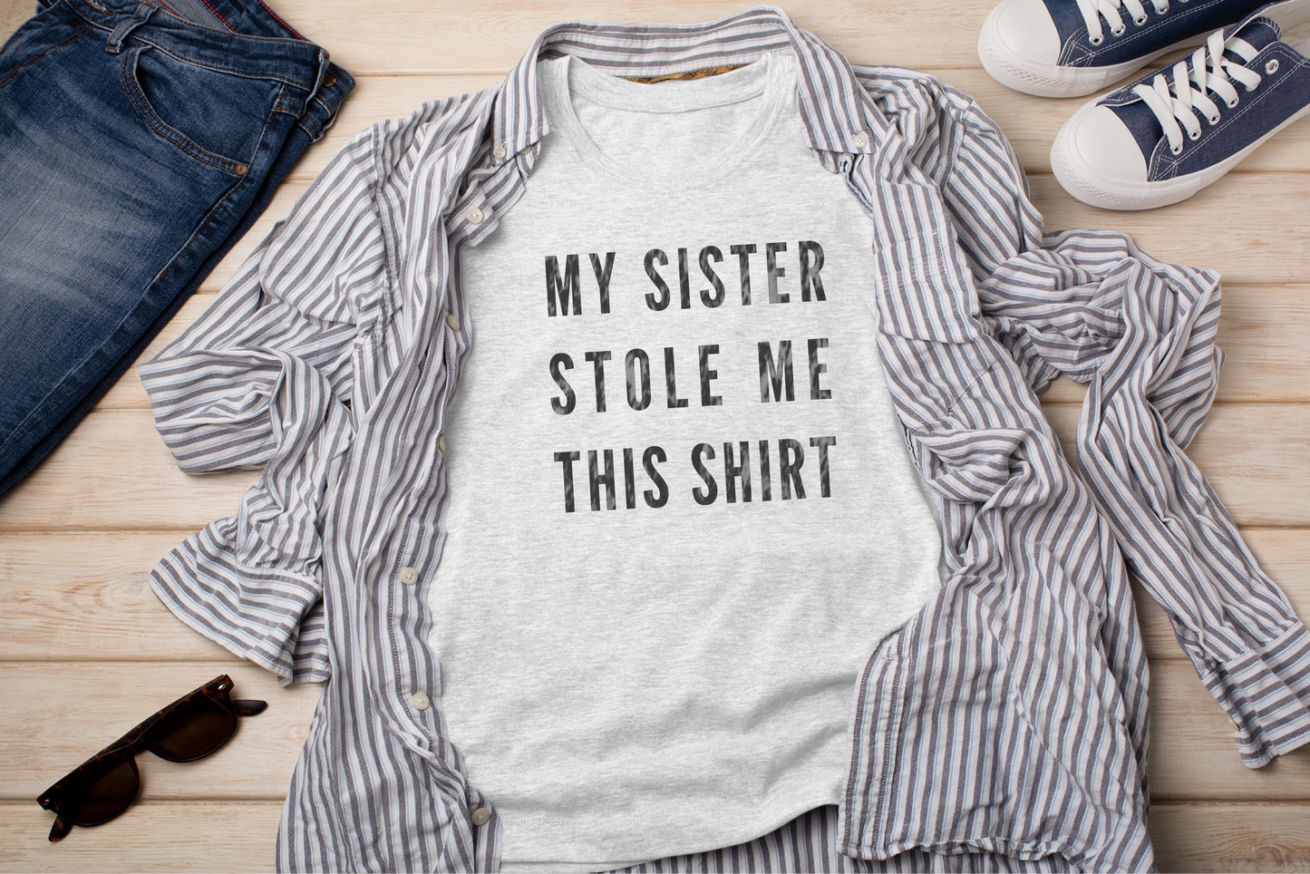 a shirt that says, my sister stole me this shirt