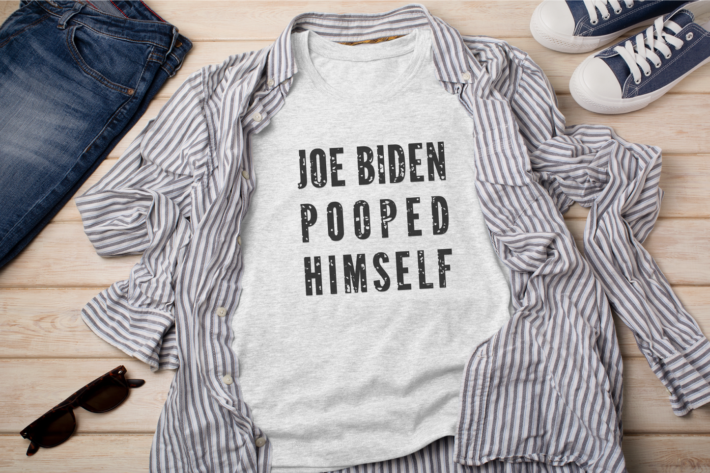 a t - shirt that says joe biden pooped himself