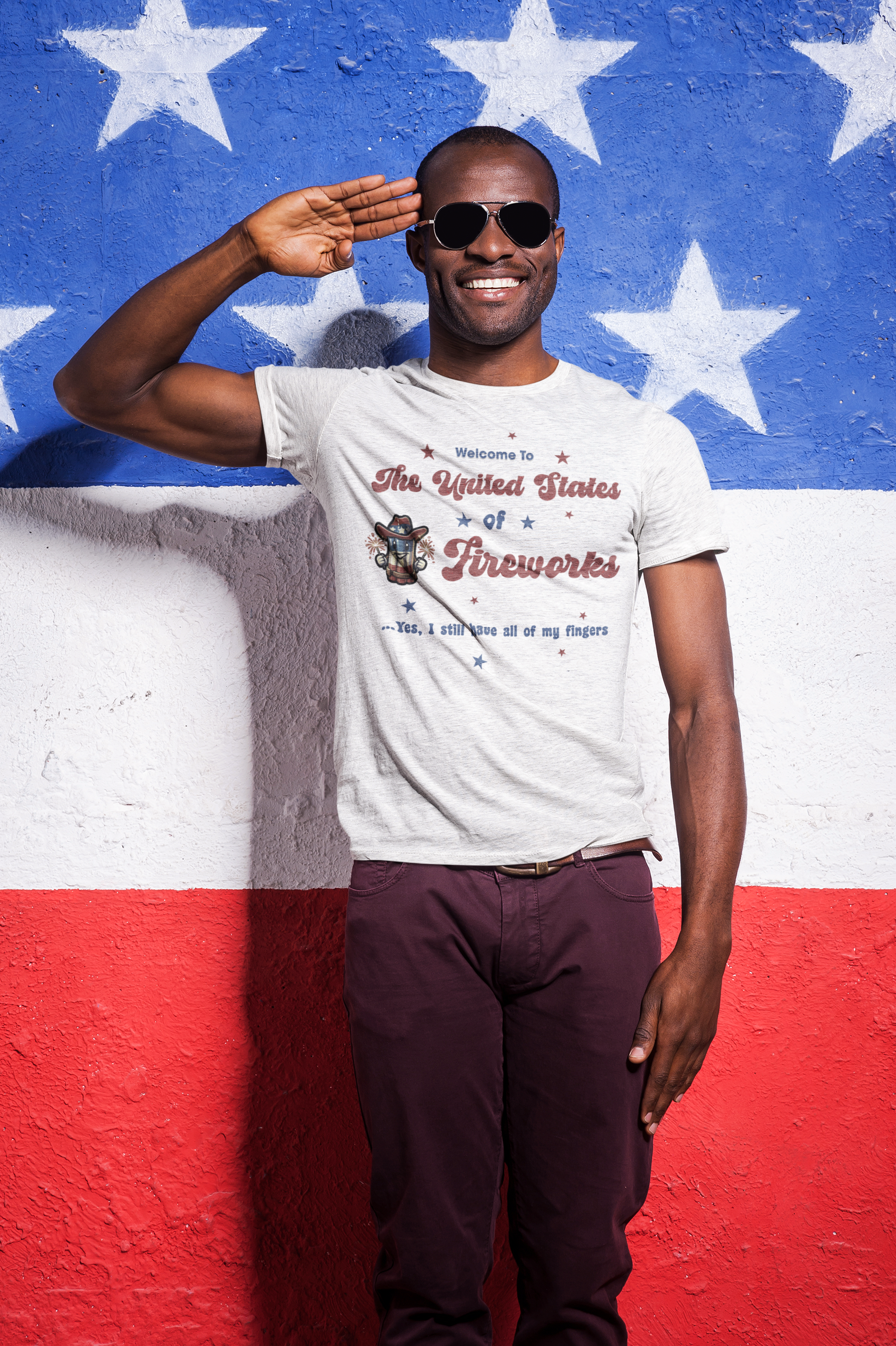 a man standing in front of an american flag