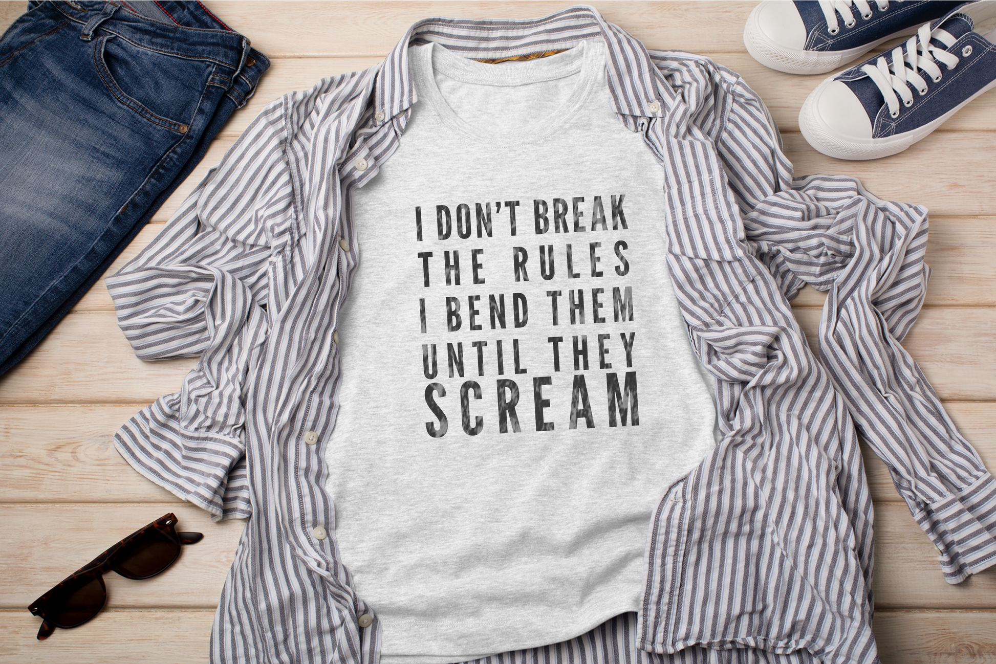 a shirt that says i don't break the rules i bend them until they