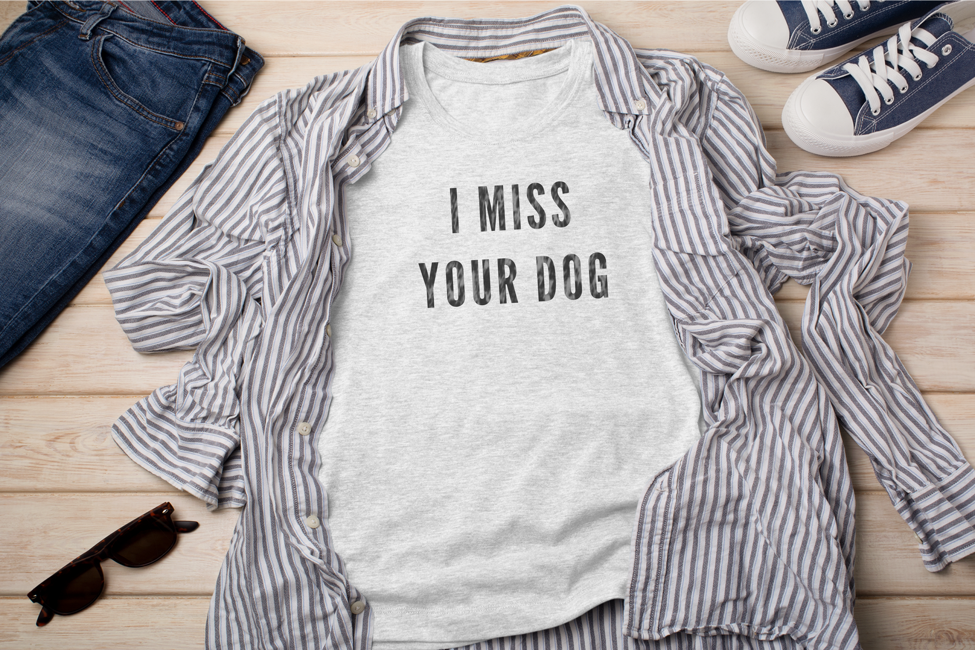 a shirt that says i miss your dog on it