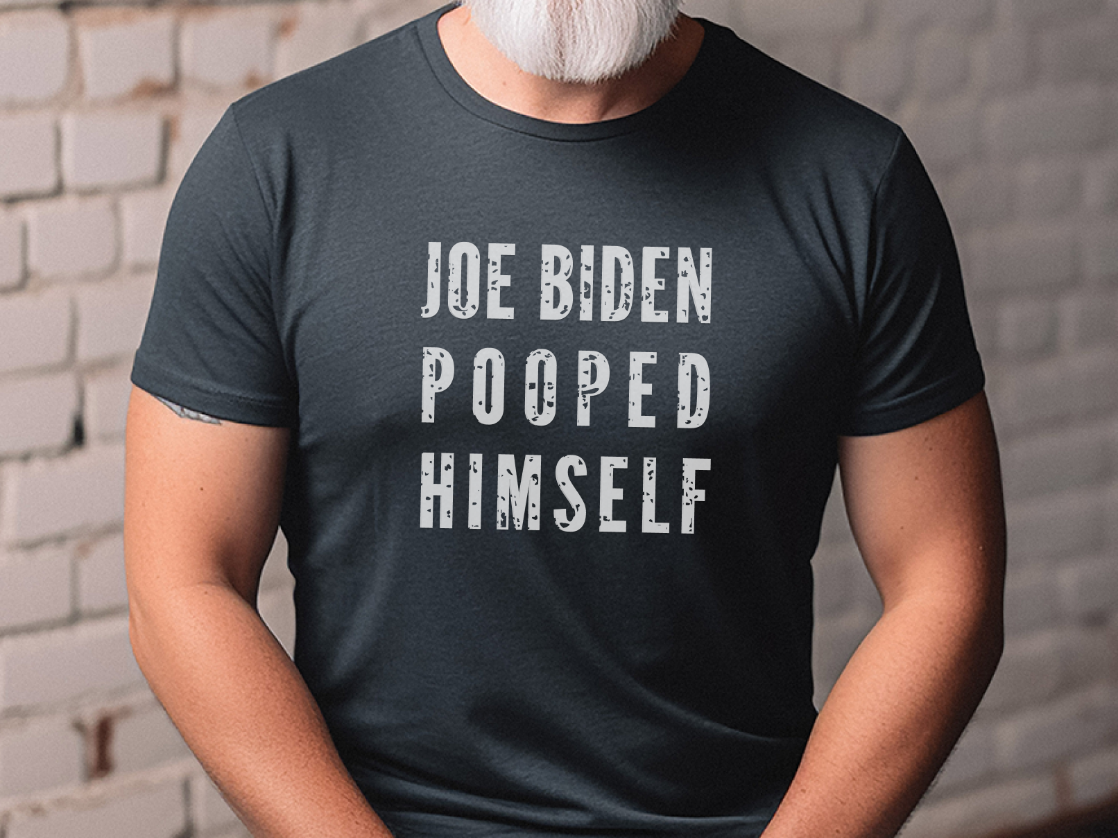 a man wearing a joe biden pooped himself t - shirt