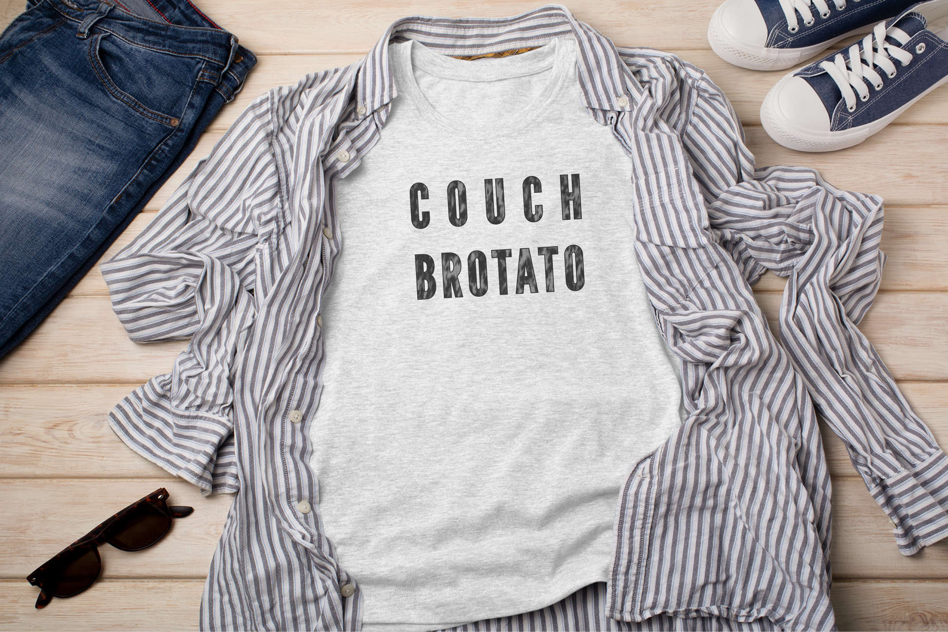 a t - shirt that says couch brootato on it