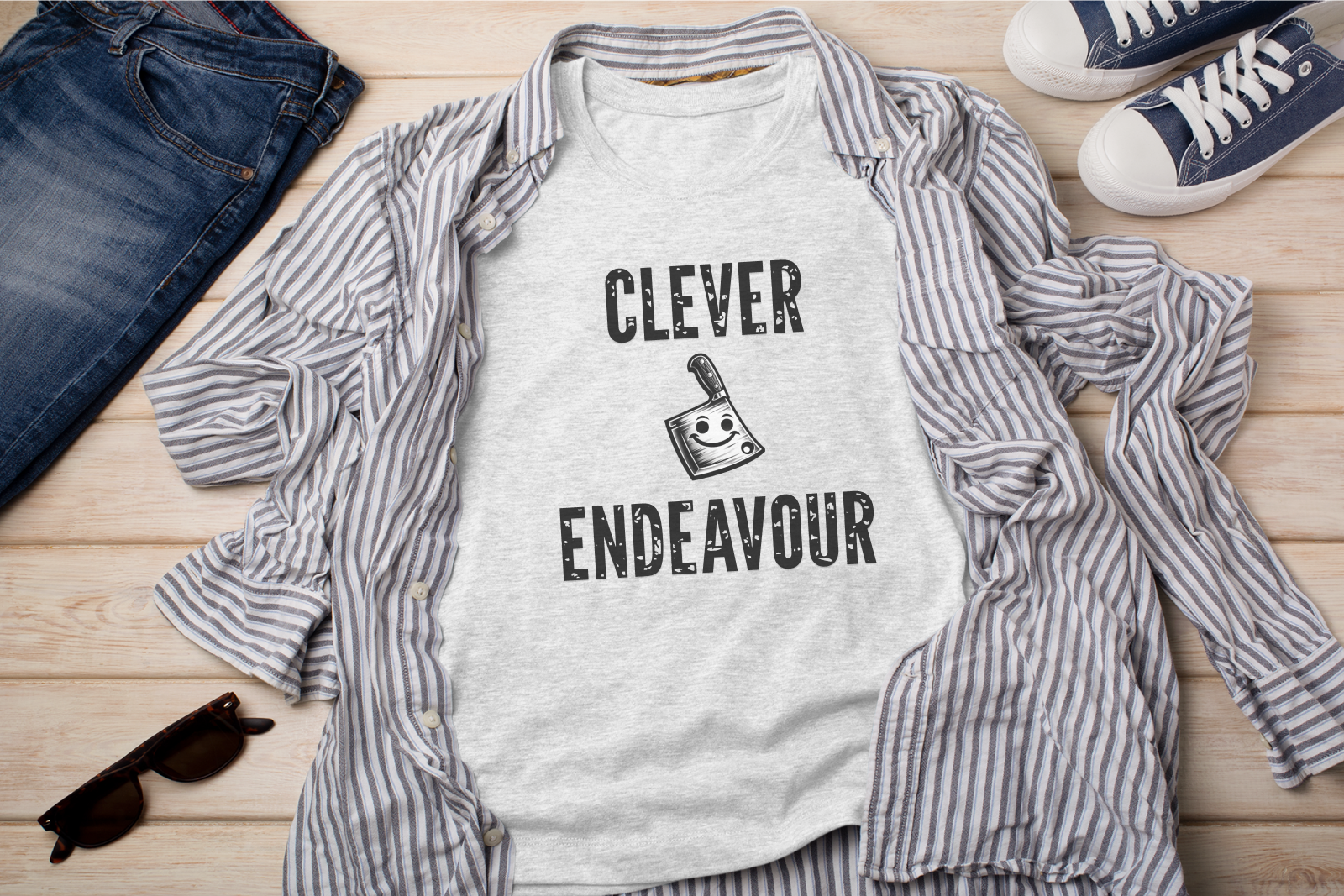 a t - shirt that says clever and a pair of sunglasses