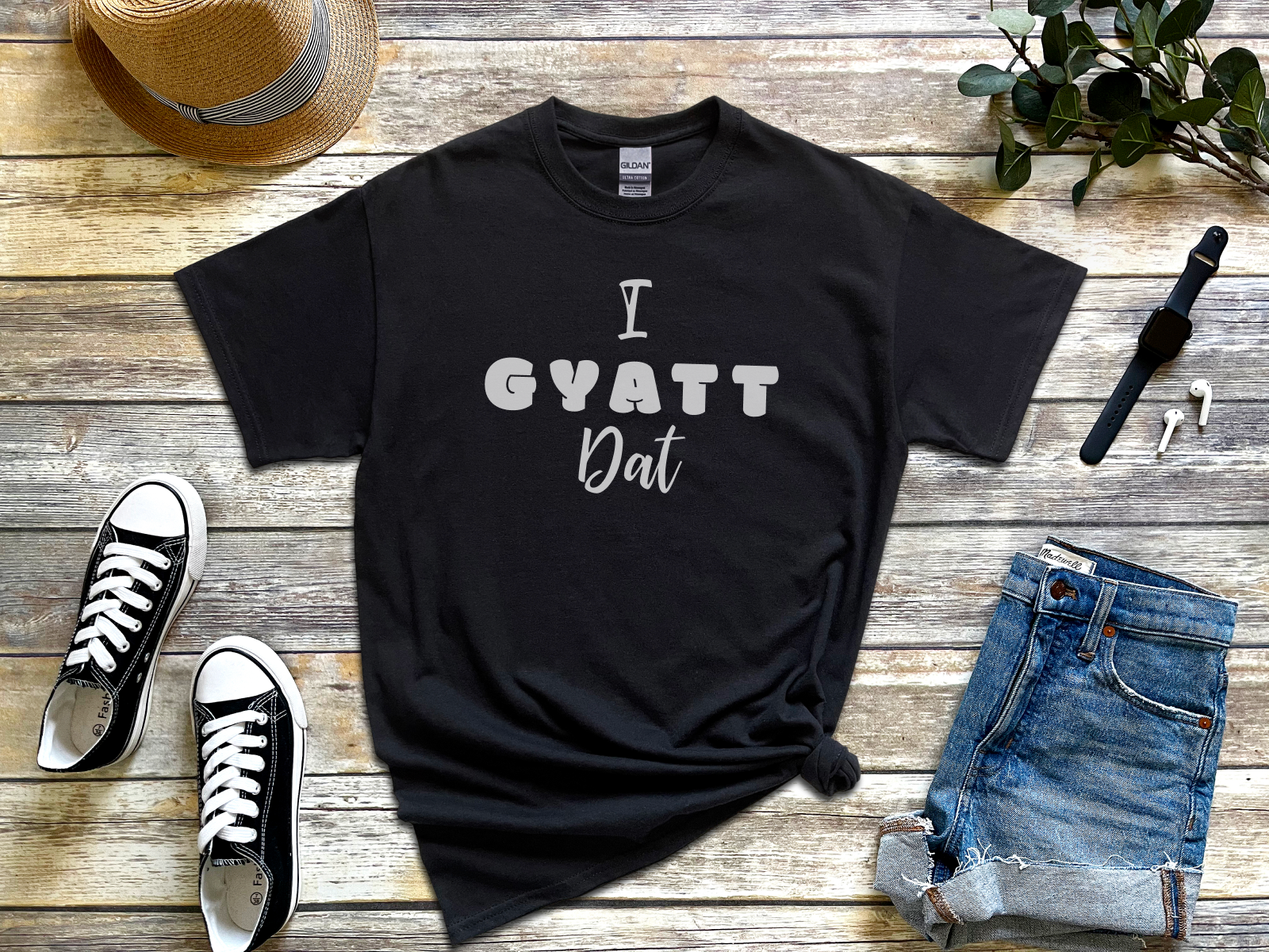 a t - shirt that says i squatt out next to a pair of jeans