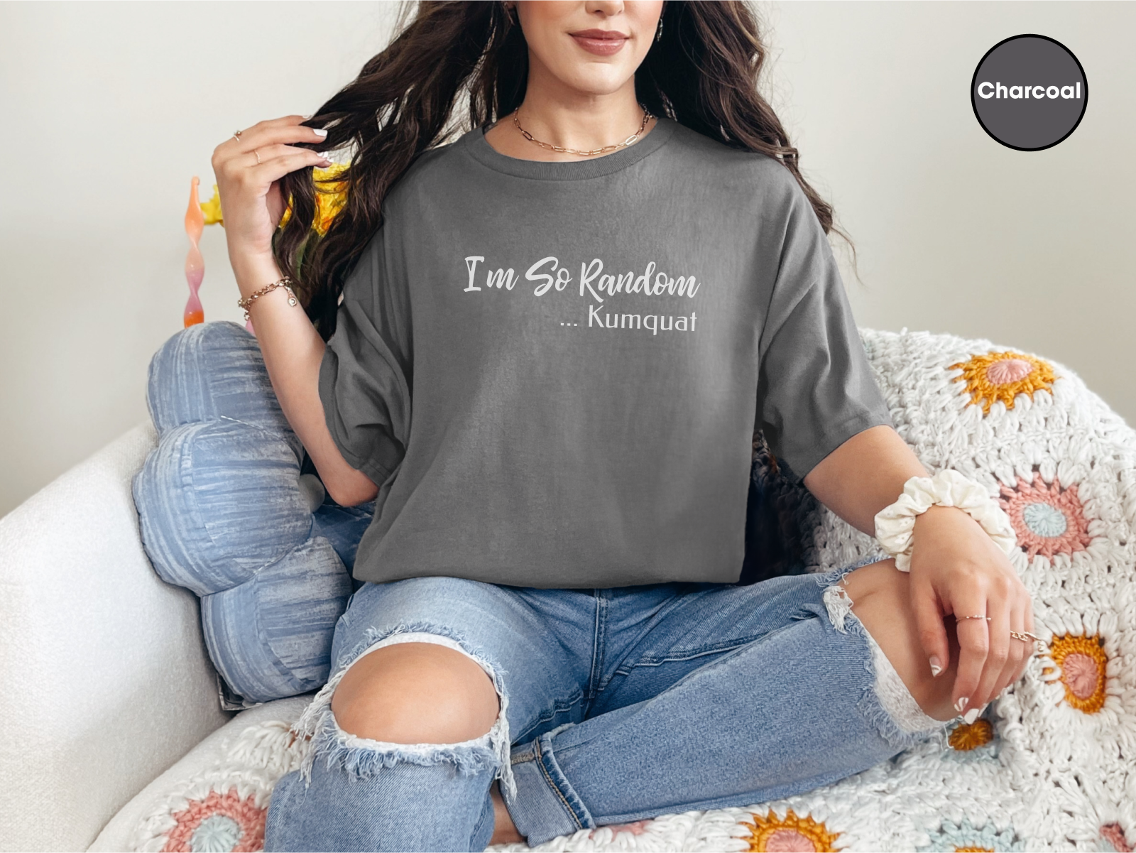 a woman sitting on top of a white couch