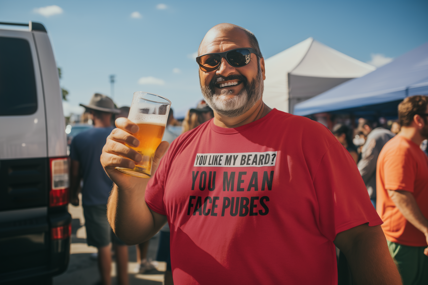 a man in a red shirt holding a glass of beer