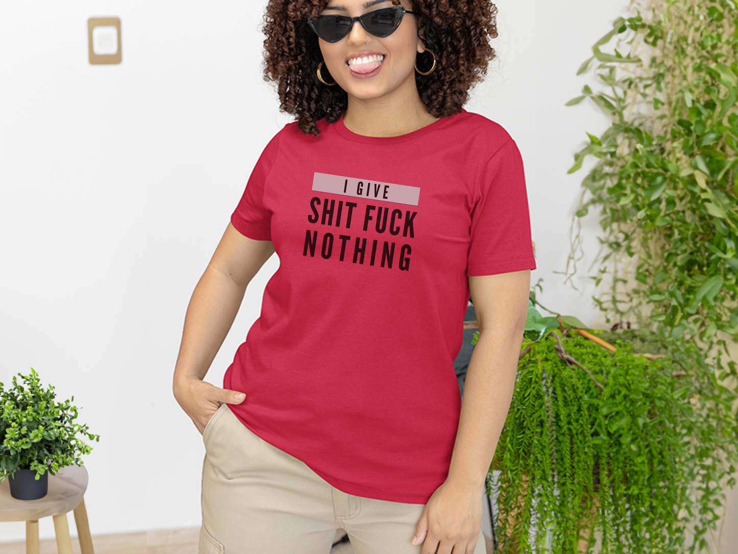 a woman wearing a red shirt that says i love shit flickk nothing