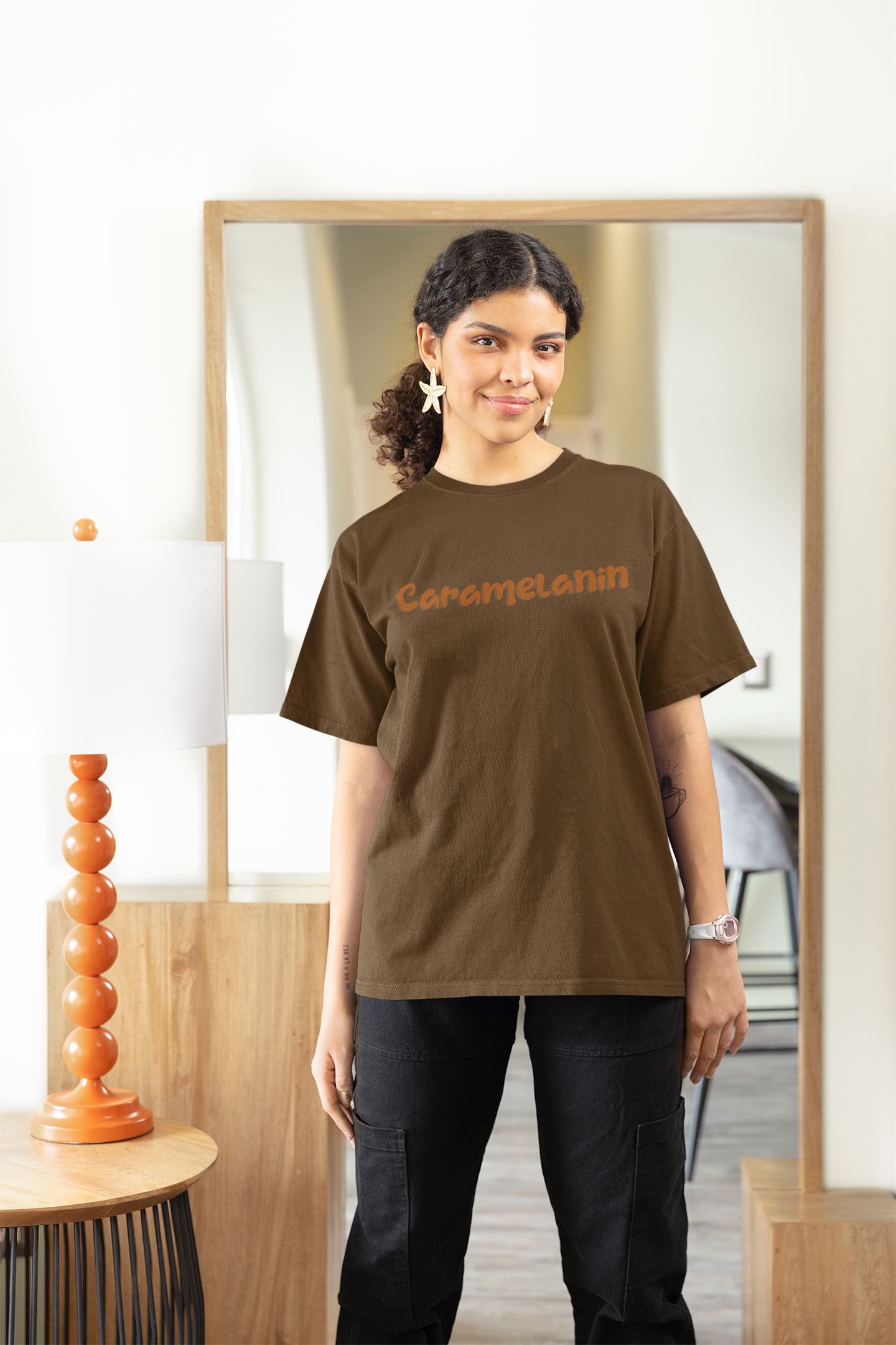gildan-t-shirt-mockup-of-a-woman-with-curly-hair-posing-in-her-living-room-m32060.png